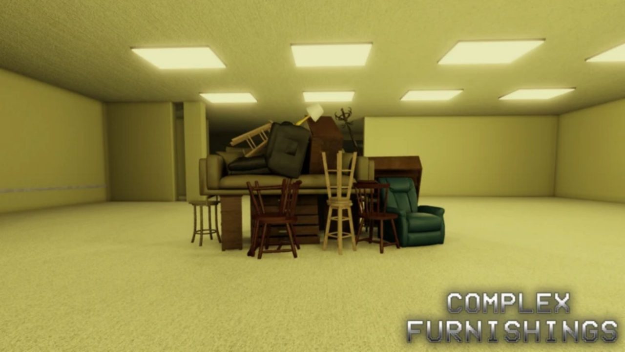 Complex Furnishings furniture piled up in a yellow-lit stockroom.