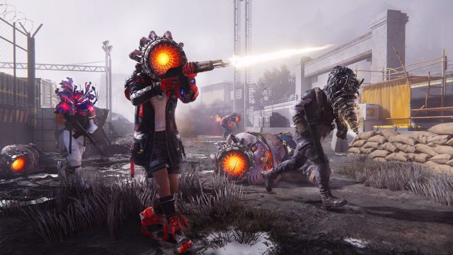 Once Human characters with monstrous heads fighting in an industrial yard.